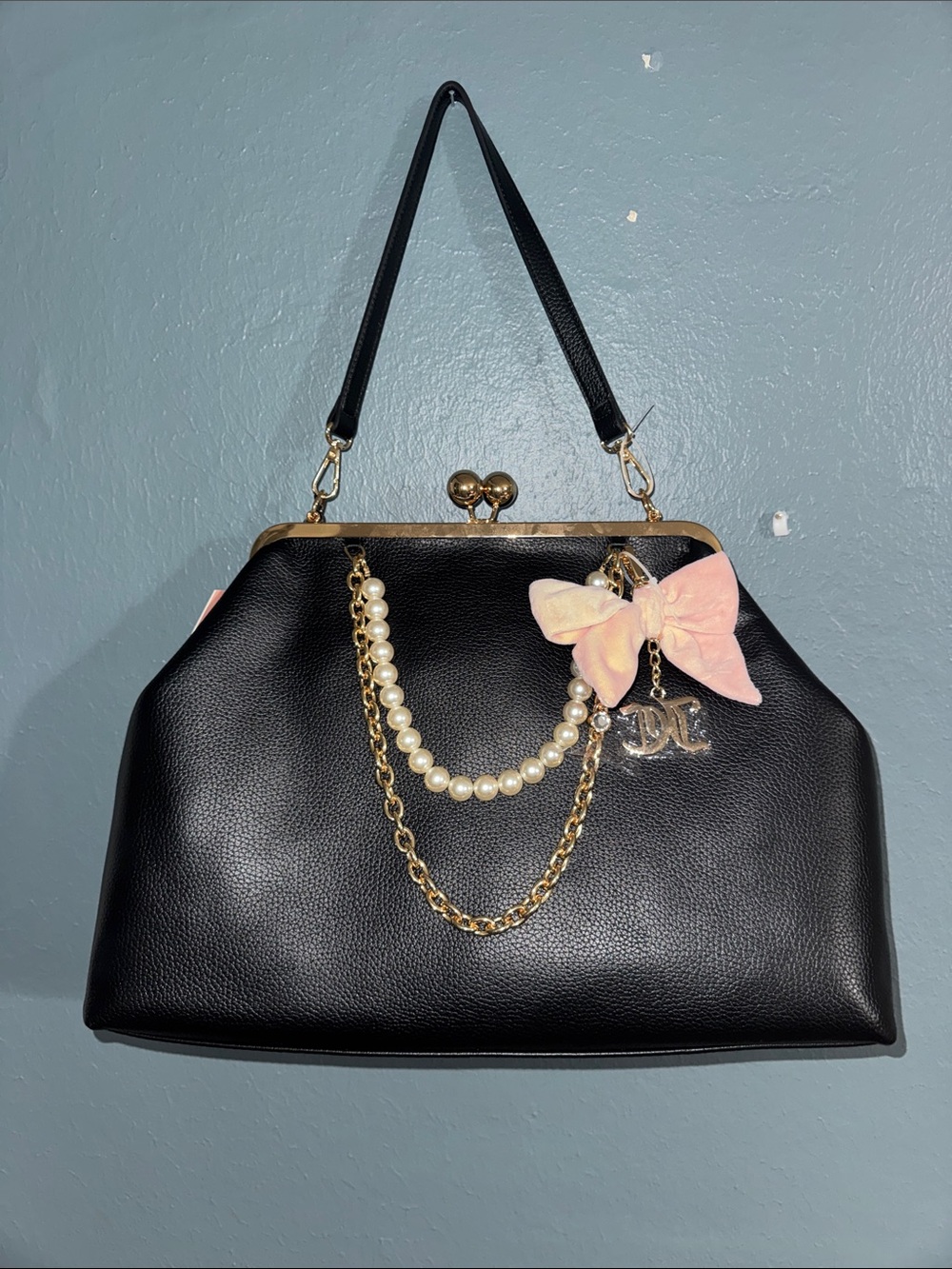 Juicy Couture Black Kisslock Bag with Pearl & Pink Bow Charm